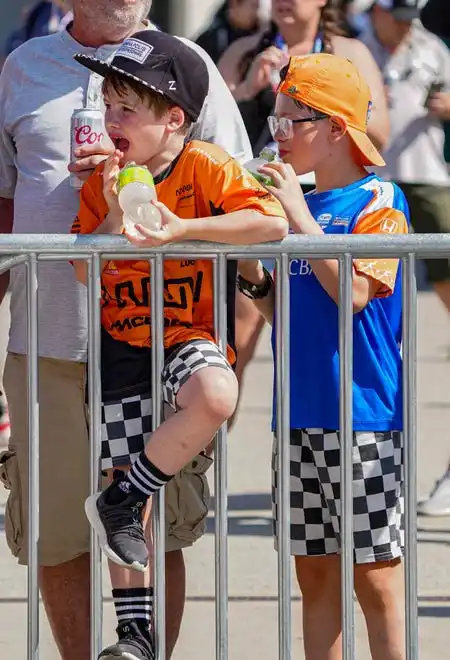 Fans dress to impress on Thursday, May 23, 2024, during Carb Day ahead of the 108th running of the Indianapolis 500 at Indianapolis Motor Speedway.