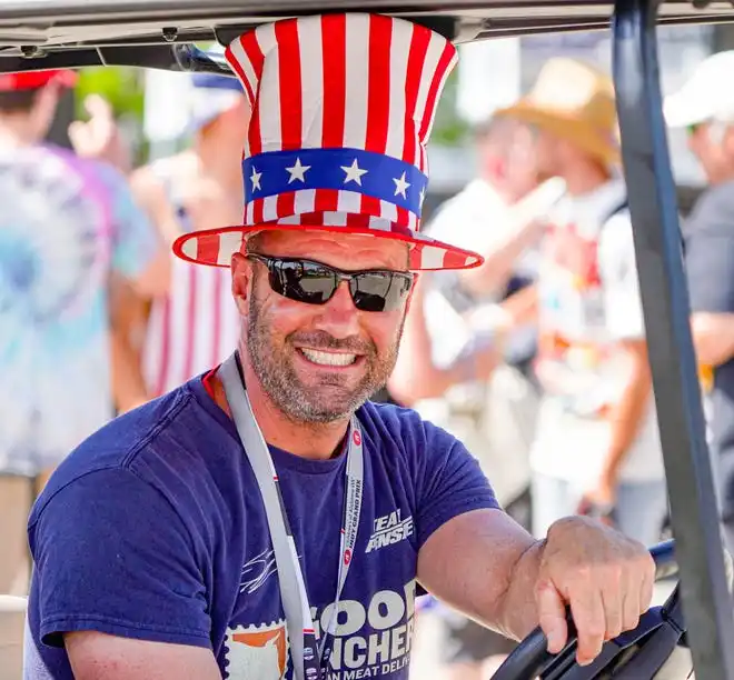 Fans dress to impress on Thursday, May 23, 2024, during Carb Day ahead of the 108th running of the Indianapolis 500 at Indianapolis Motor Speedway.