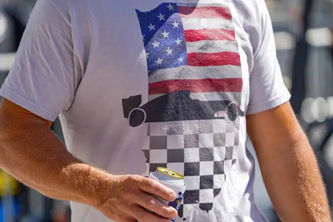 Fans dress to impress on Thursday, May 23, 2024, during Carb Day ahead of the 108th running of the Indianapolis 500 at Indianapolis Motor Speedway.