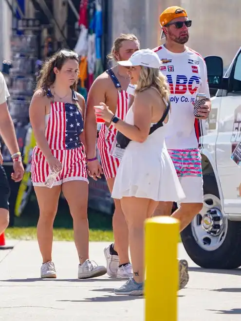 Fans dress to impress on Thursday, May 23, 2024, during Carb Day ahead of the 108th running of the Indianapolis 500 at Indianapolis Motor Speedway.