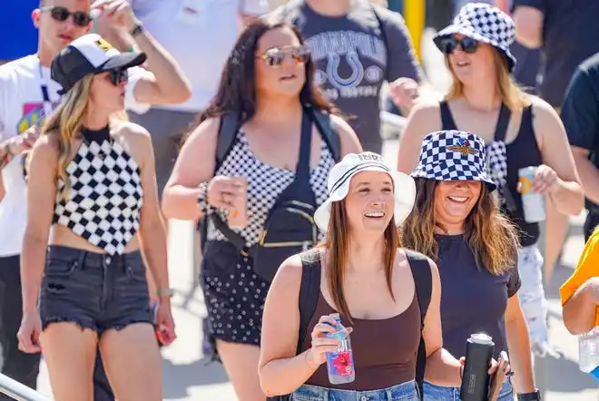 Fans dress to impress on Thursday, May 23, 2024, during Carb Day ahead of the 108th running of the Indianapolis 500 at Indianapolis Motor Speedway.