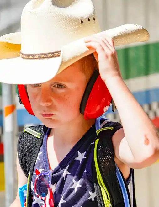 Graham Billingsley keeps cool in his cowboy hat on Friday, May 24, 2024, during Carb Day ahead of the 108th running of the Indianapolis 500 at Indianapolis Motor Speedway.