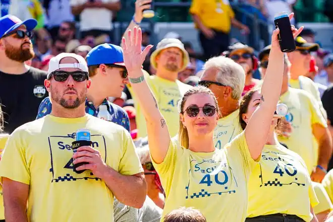 Fans dress to impress on Thursday, May 23, 2024, during Carb Day ahead of the 108th running of the Indianapolis 500 at Indianapolis Motor Speedway.