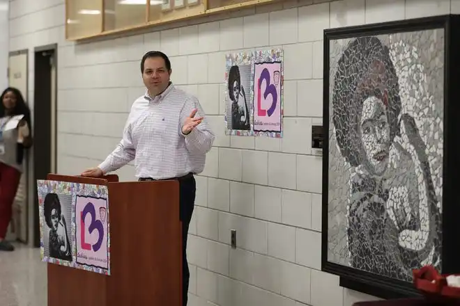 Joe Morelle Jr. executive director of UNICON , which represents unions and management leaders, talks about how UNICON will continue to provide support, including material, and are committed to helping the school create the murals of pioneering women for the next 10 years. Edison Career and Technology High School unveiled their Ladies Ladders & Lenses mosiac mural at the school. LaJour Dunlop, Angela Vasquez, Yaidymar Flores, Amari Coley-Henderson, A’Zariah Williams and CeCe Jones, construction and design students at the school, made the mosaic to honor the Black Rosies of World War II.