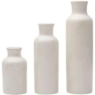 three white vases from scott living on a white background