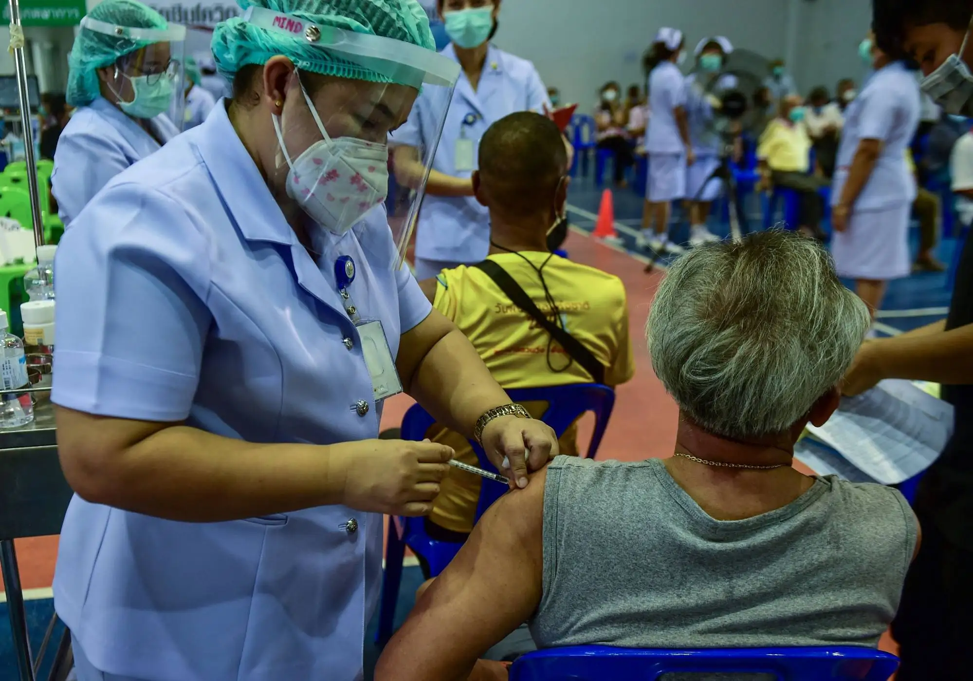 Nurses administer doses of the AstraZeneca Covid-19 coronavirus vaccine at a hospital compound in Thailand’s Narathiwat province in June 2021. Photo: AFP