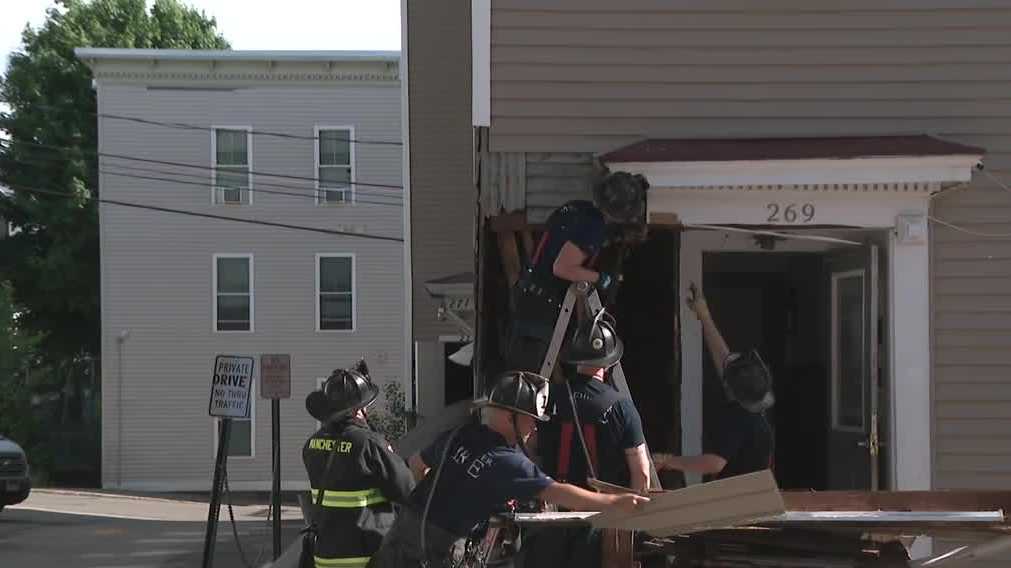 Gas leak breaks out after car hits building in Manchester, authorities say