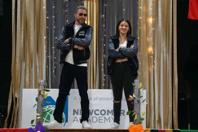 Luis Suazo and Naomi Suazo show off their outfits at the Newcomer Academy Fashion Show on Friday, April 19, 2024.