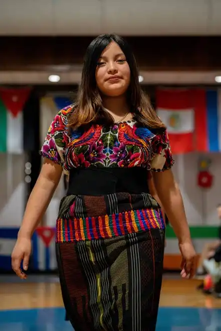 Vilma Luis Ajqui walks down the runway showing off her outfit during the Newcomer Academy Fashion Show on Friday, April 19, 2024.