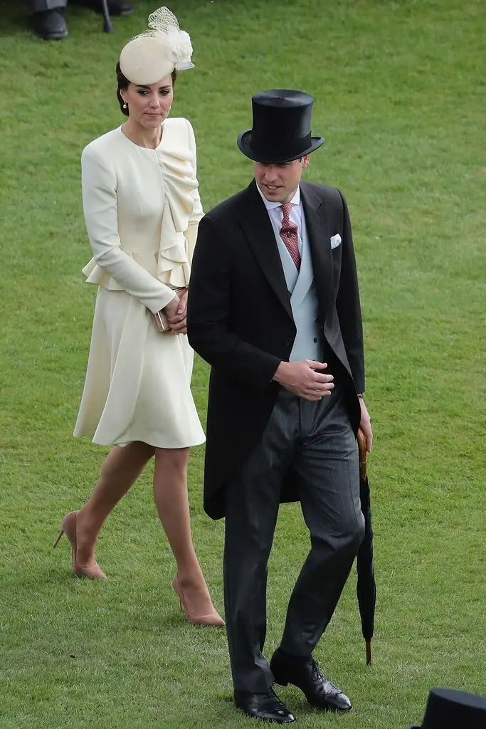 Prince William, Duke of Cambridge and Catherine, Duchess of Cambridge arrive to greet guests attending a garden party at Buckingham Palace on May 24, 2016 in London, England.  