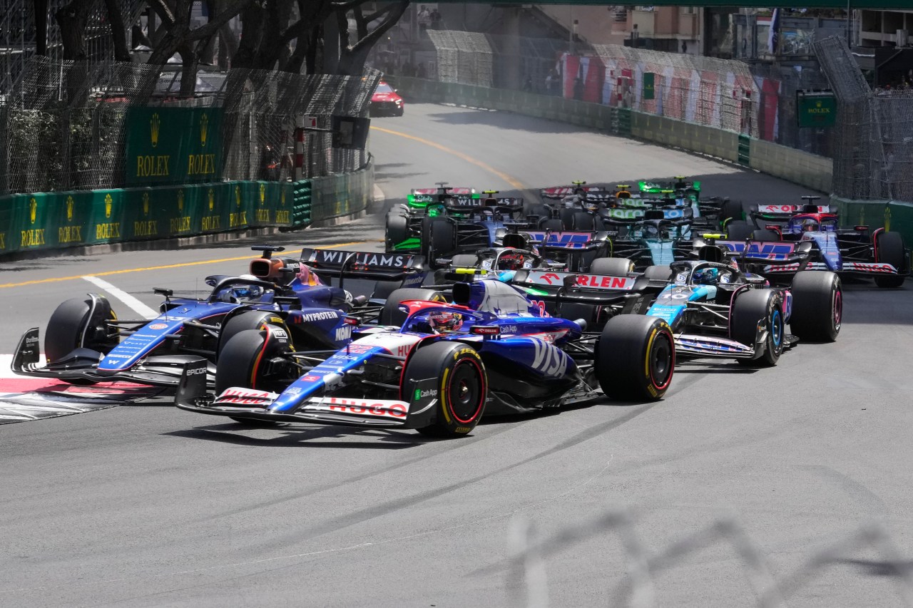 Big crash involving 3 cars on 1st lap of Monaco GP brings out red flag to temporarily halt race