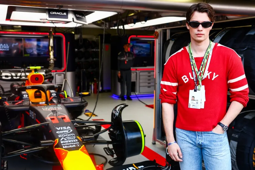 Nicholas Galitzine poses for a photo outside the Oracle Red Bull Racing garage prior to the F1 Grand Prix of Monaco at Circuit de Monaco on May 26, 2024 