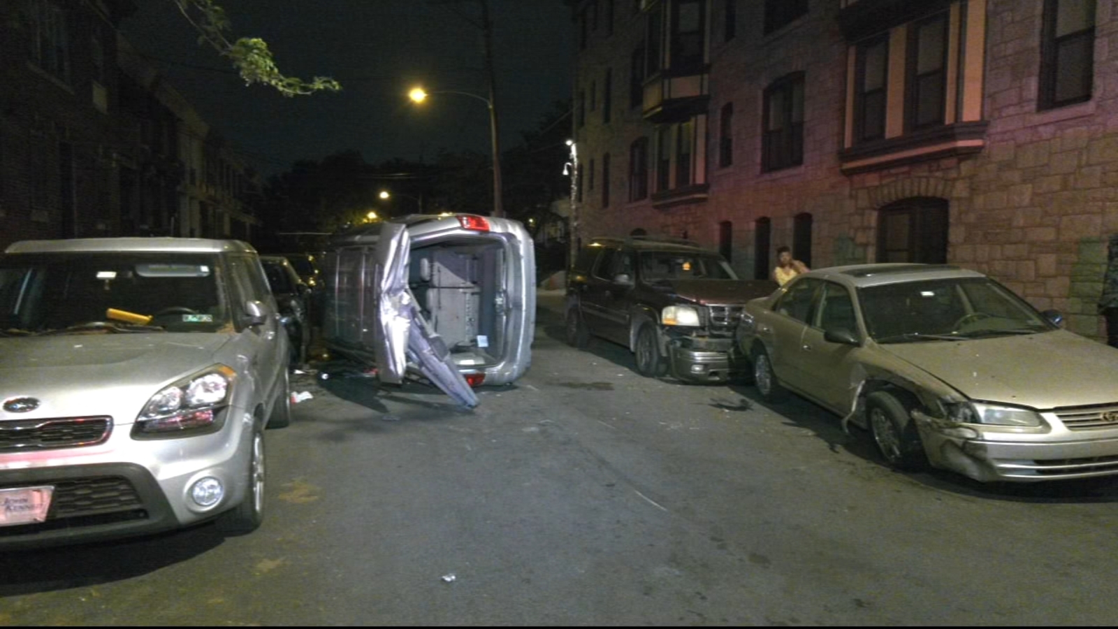 Woman hospitalized after crashing vehicle into several parked cars in Spruce Hill