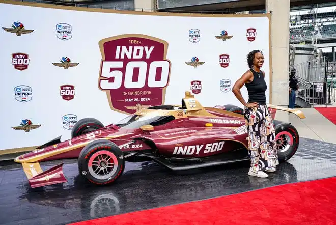 Retired WNBA player Tamika Catchings walks the celebrity red carpet on Sunday, May 26, 2024, during the 108th running of the Indianapolis 500 at Indianapolis Motor Speedway.