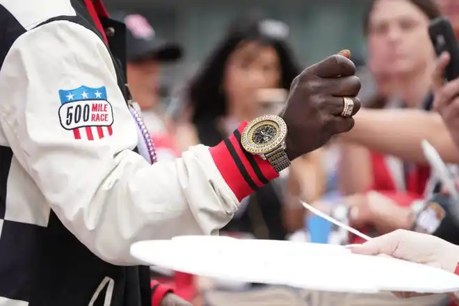 Flavor Flav walks the celebrity red carpet on Sunday, May 26, 2024, during the 108th running of the Indianapolis 500 at Indianapolis Motor Speedway.