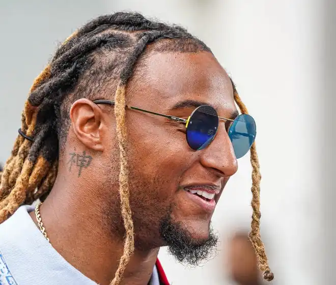 NFL Football player Justin Reed walks the celebrity red carpet on Sunday, May 26, 2024, during the 108th running of the Indianapolis 500 at Indianapolis Motor Speedway.