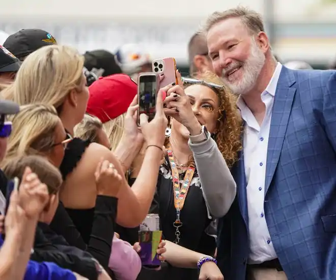 Vocalist Jim Cornelison walks the celebrity red carpet on Sunday, May 26, 2024, during the 108th running of the Indianapolis 500 at Indianapolis Motor Speedway.