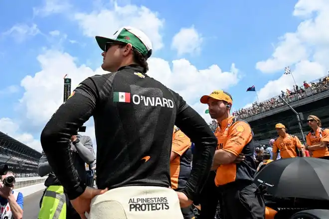 Arrow McLaren driver Pato O'Ward (5) looks out from pit lane Saturday, May 18, 2024, during qualifying for the 108th running of the Indianapolis 500 at Indianapolis Motor Speedway.