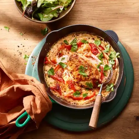 Chicken with red pepper and smoky parmesan cream.
