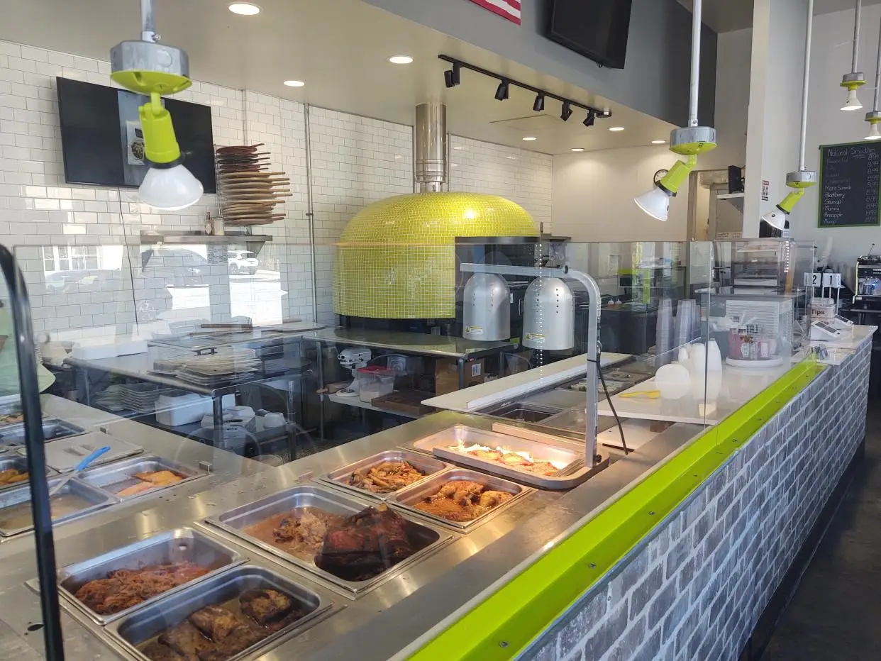 At the Latin Melting Pot in Vero Beach, you can order from the 'hot foods' menu or build your own combo.