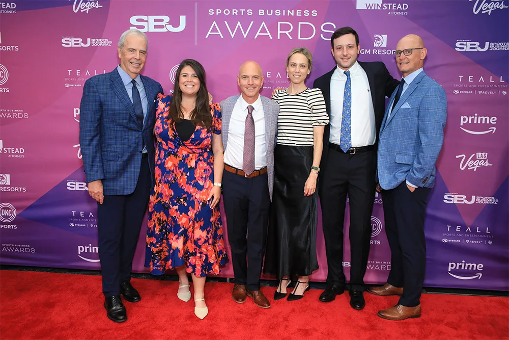Charlie Besser and Intersport team