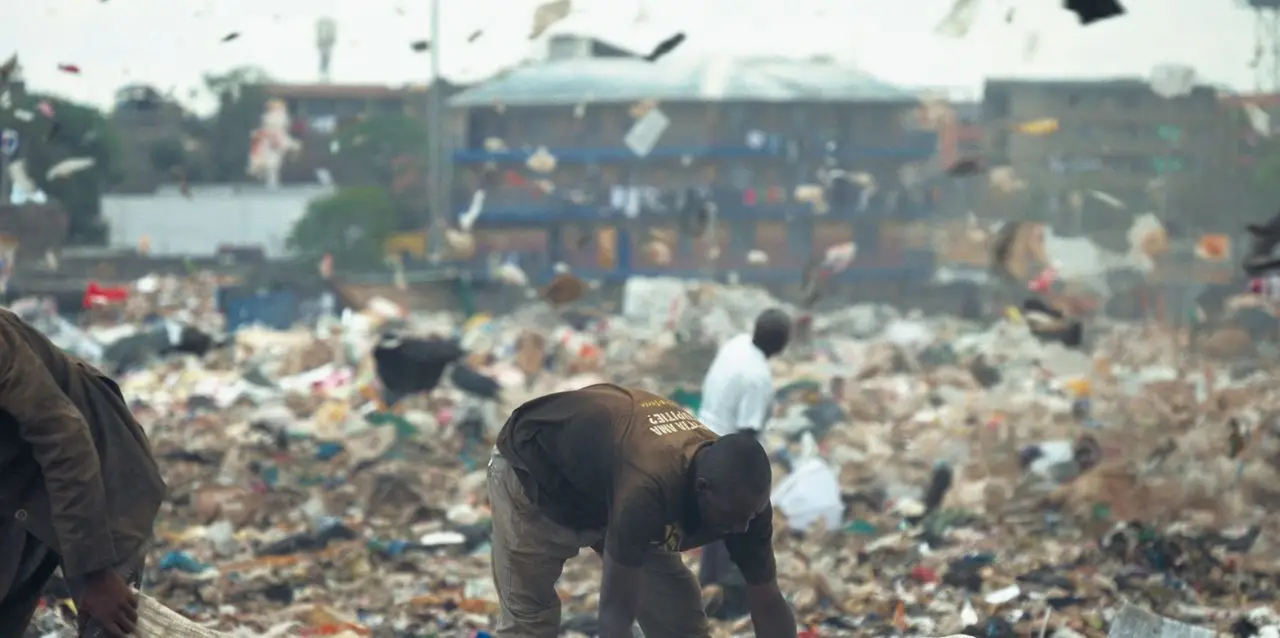 Much of the clothing advanced nations discard end up in Kenyan landfills. (© Generation 11)