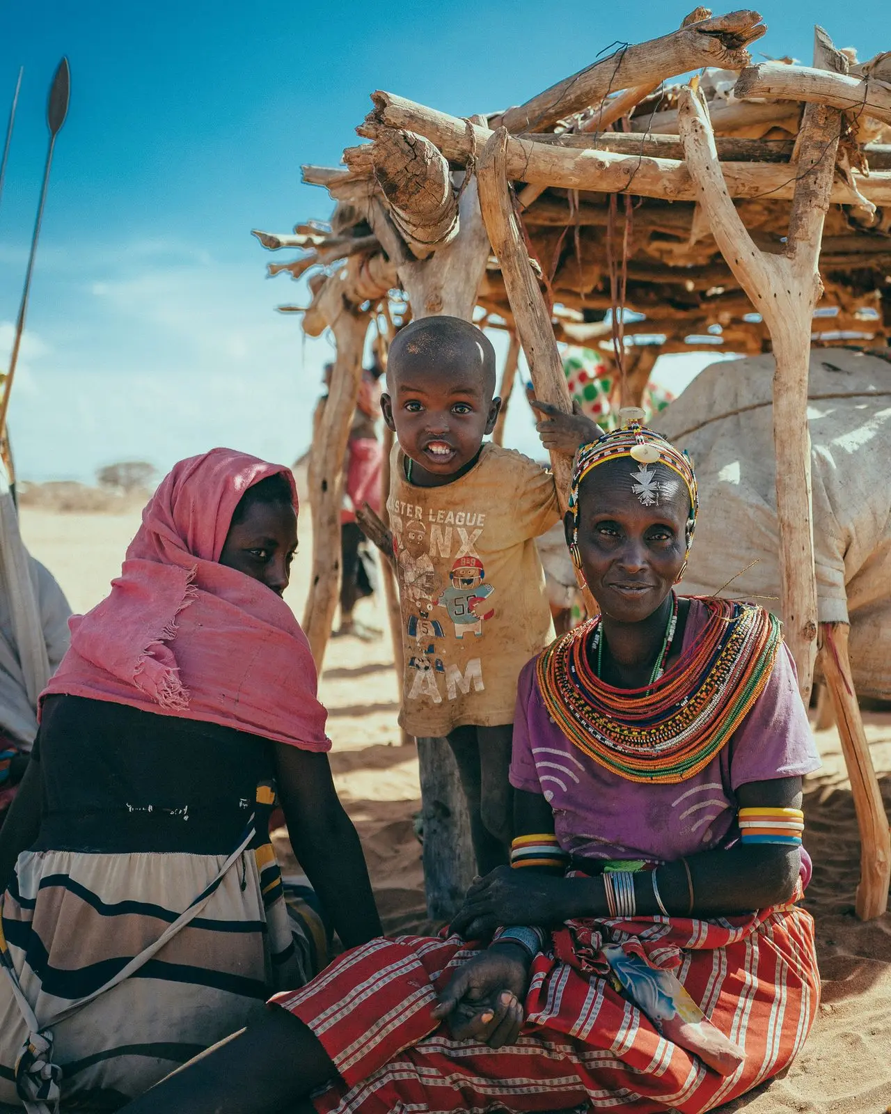 Women display colorful traditional beads in Kenya’s northern Marsabit region. (© Generation 11)