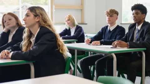 Getty Images Children sitting in a classroom
