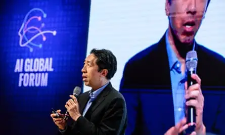 Andrew Ng speaking on stage at the summit