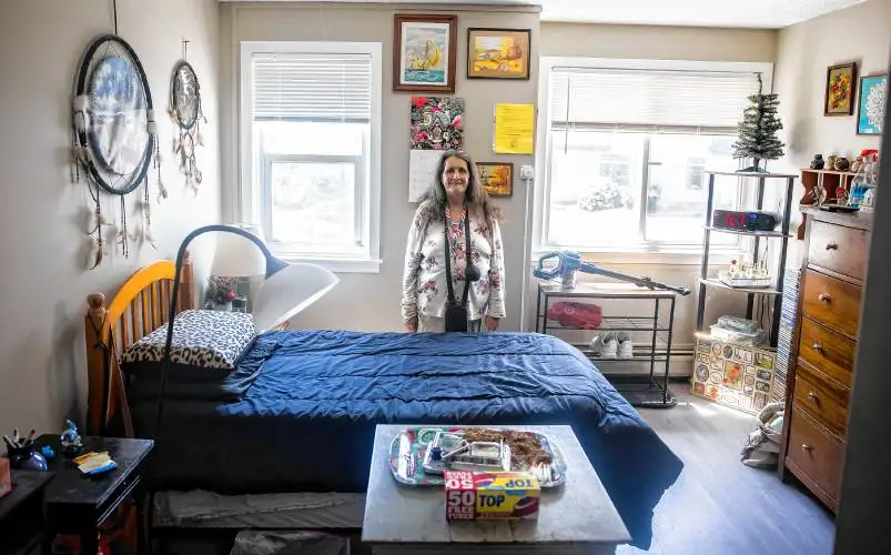 Denise DeLew keeps her room clean and orderly at the Fellowship Housing apartments in downtown Concord on Wednesday, May 22, 2024.