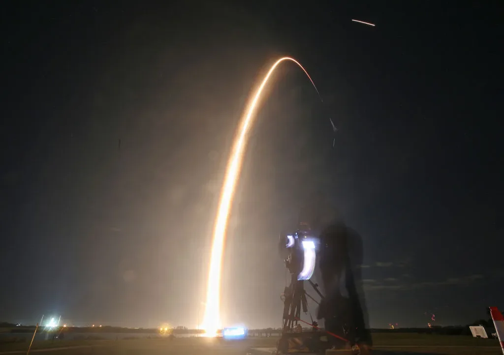 A SpaceX Falcon 9 rocket lifts off from launch pad LC-39A at the Kennedy Space Center with the Intuitive Machines' Nova-C moon lander mission, named Odysseus in Cape Canaveral, Florida, 15 February 2024. Photo by GREGG NEWTON/AFP via Getty Images