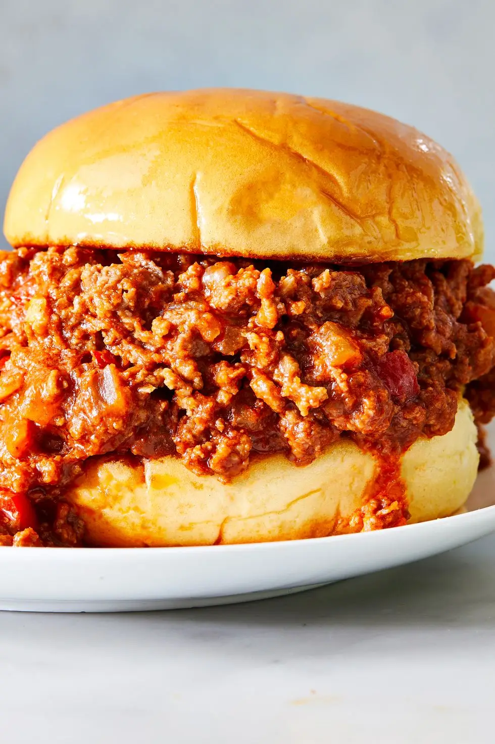 sloppy joes served on a toasted bun with chips