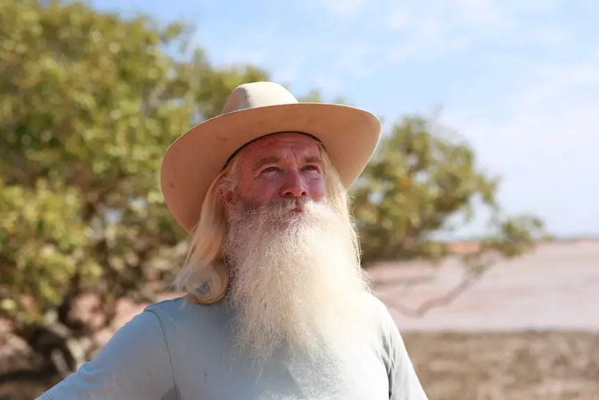 Astronomer Greg Quicke looks up into sky