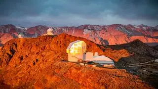 A photo of the Vera C Rubin observatory at sunset