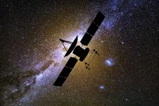 A photo of a spacecraft against a starry sky