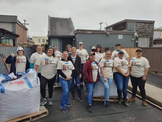 SAN DIEGO: More than 170 women volunteer at San Diego Habitat for Humanity's Women Build event....San Diego Habitat for Humanity's 16th Annual Women Build drew more than 170  women from across San Diego County. Volunteer builders restored the safety of a Logan Heights duplex, which was damaged from flooding during Jan.'s rainstorms. The project included repairing the duplex's exterior and replacing the deteriorating fencing along with planting drought and flood-resistant landscaping. At the same time, 11 teams built playhouses that will be donated to nonprofits that help area families in need, such as the Make-A-Wish Foundation and The Chicano Federation. The event, raised more than $100,000  through sponsors and volunteers, and culminated with San Diego Habitat for Humanity honoring Luda Safransky with the Women Builder of the Year Award for her eight years of participation in the annual event, bringing together more than three dozen builders. Since it started in 2009, Women Build has brought together more than 2,300 volunteers to build or renovate 65 homes across San Diego County and raised more than $1.2 million to support affordable homeownership programs...(Courtesy of San Diego Habitat for Humanity.)