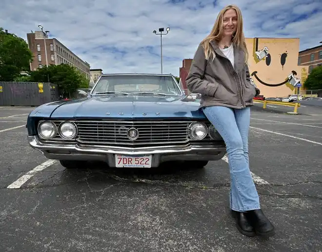 Father's Day classic car show organizer Grayson LaCroix and her 1964 Buick.