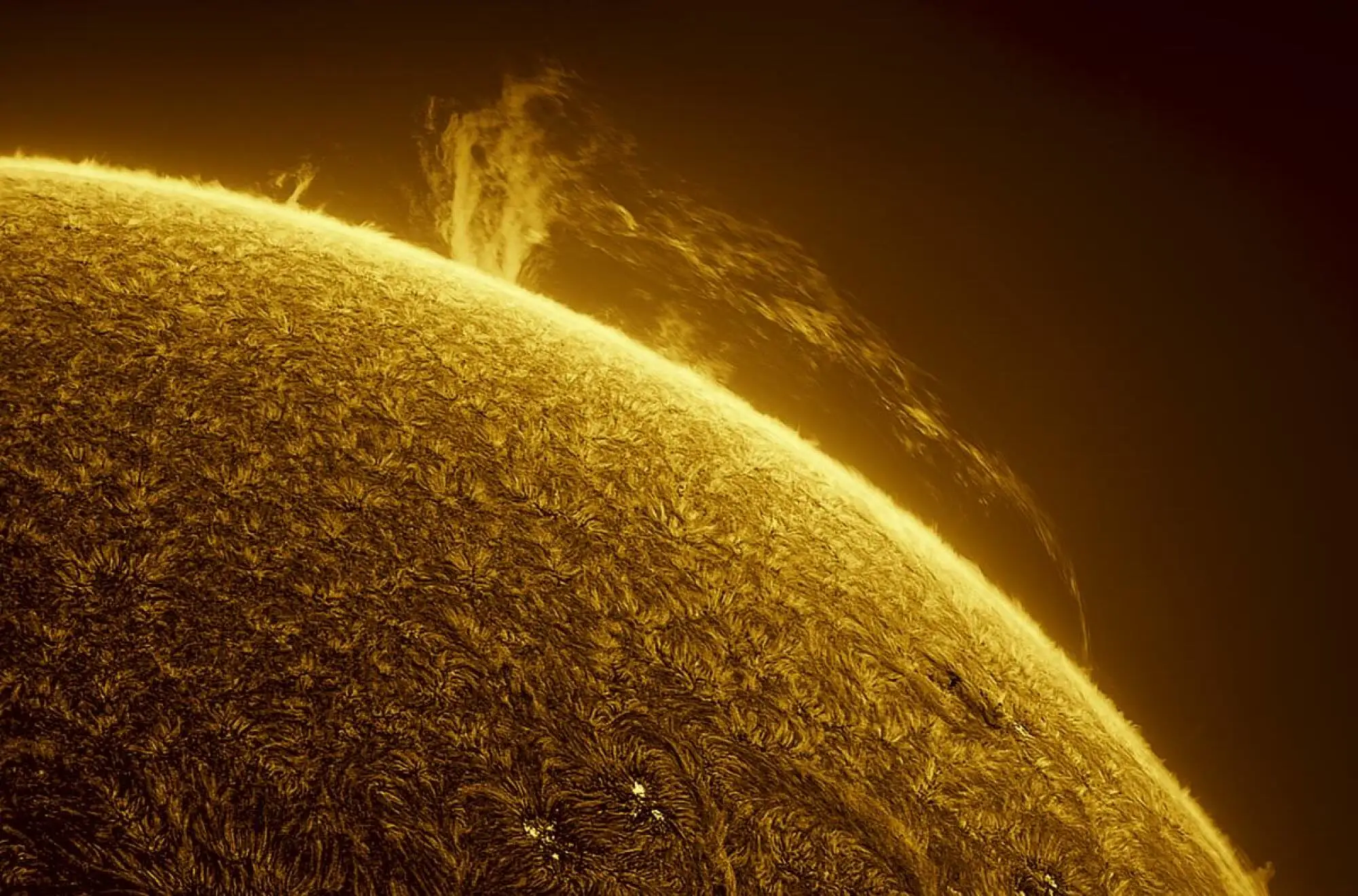 This is a still image from a time-lapse sequence of a solar prominence in Portugal.