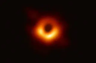 The Event Horizon Telescope, a planet-scale array of eight ground-based radio telescopes forged through international collaboration, captured this image of the supermassive black hole in the center of the galaxy M87 and its shadow.