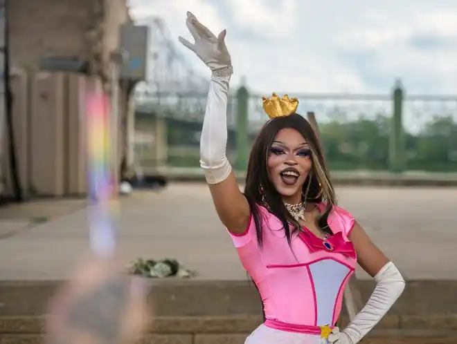 Drag artist Zoe Meltdown from Decatur poses for the crowd during a performance Saturday, July 20, 2024 at the River City Pride Festival on the Peoria riverfront.