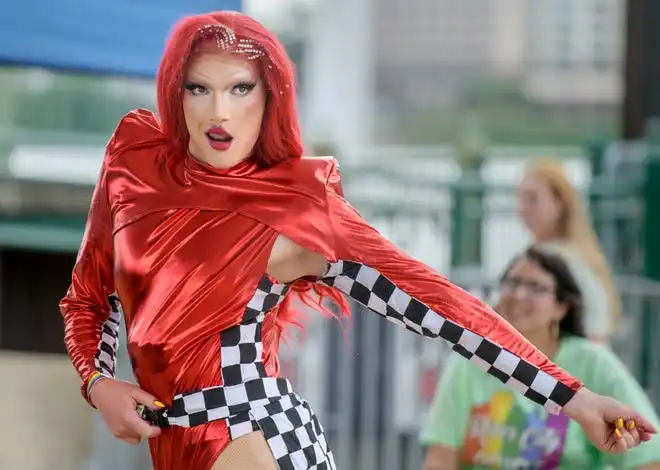 Drag performer Portia Lynn Snaps strikes a pose during her performance in the Drag Show Wars at the River City Pride Festival on Saturday, July 20, 2024 on the Peoria riverfront.