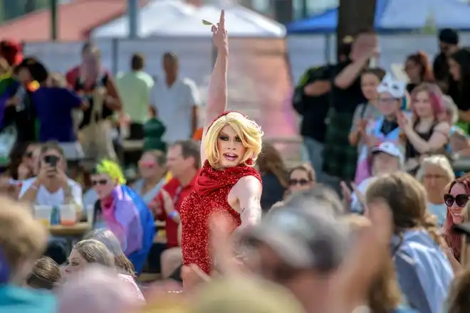 Chicago-based performer Priscilla Rock strikes a pose for the finale of her drag show during the River City Pride Festival on Saturday, July 20, 2024 on the Peoria riverfront.