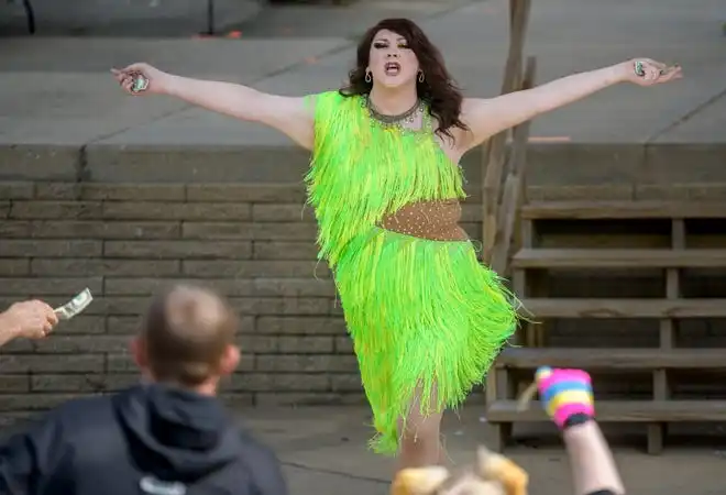 A drag performer dances during the Drag Wars show at the River City Pride Festival on Saturday, July 20, 2024 on the Peoria riverfront.