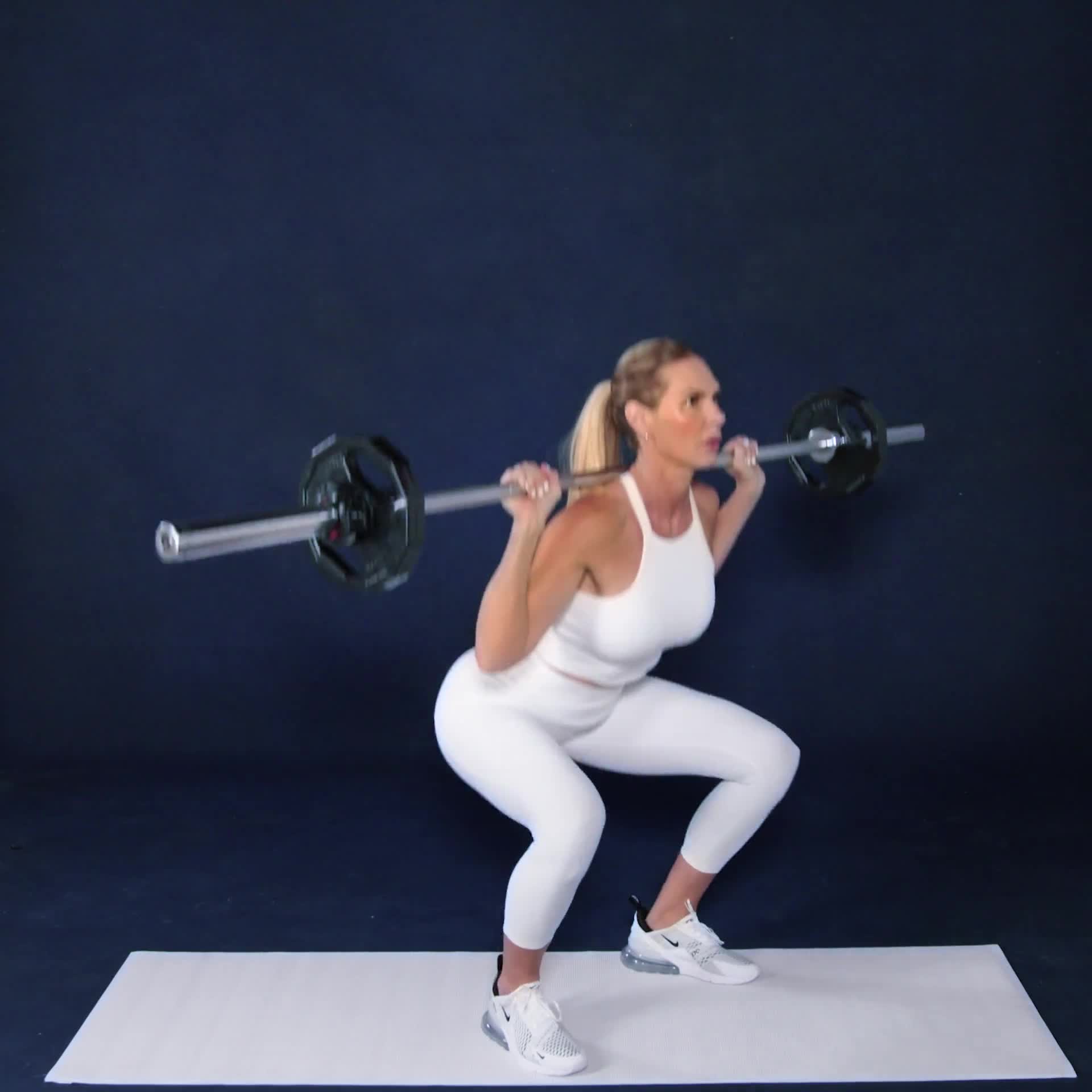 Master The Barbell Back Squat With This Golf Club Hack