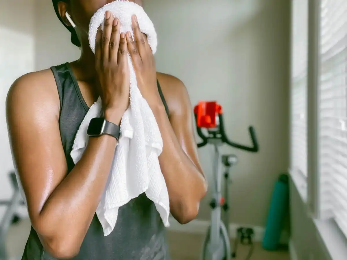 woman with towel on face