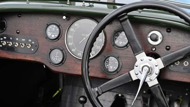 A photo of the dash in a vintage car. 