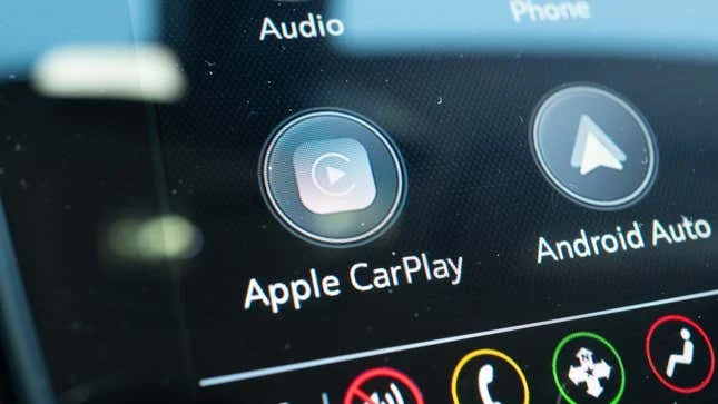 A photo of the CarPlay setup menu on a car. 