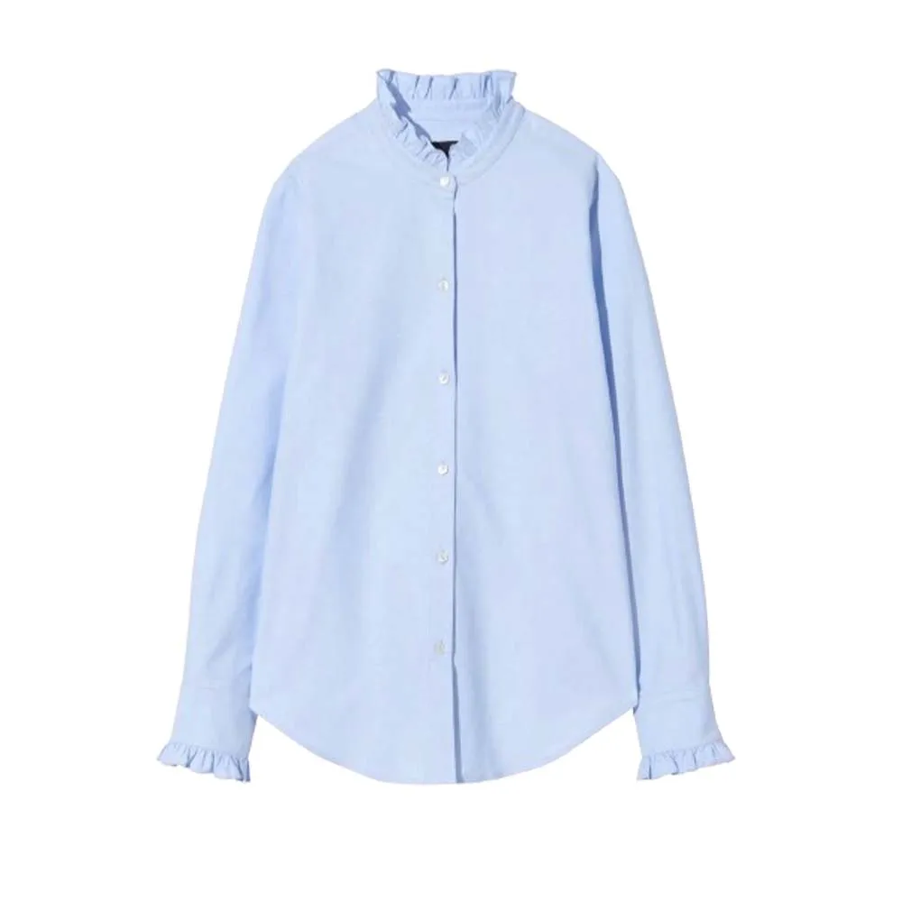 blue button down shirt with ruffle collar