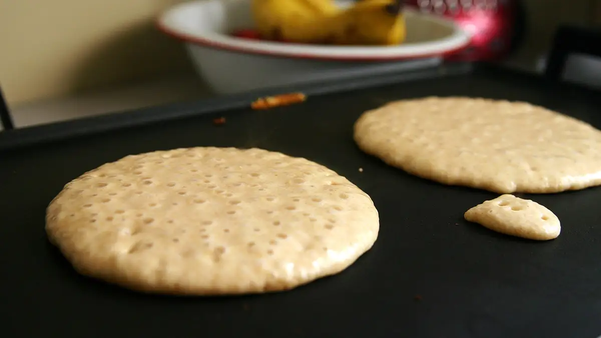 Pancakes on a griddle.