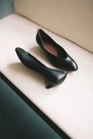 Sourcewhere image of black leather shoes by The Row